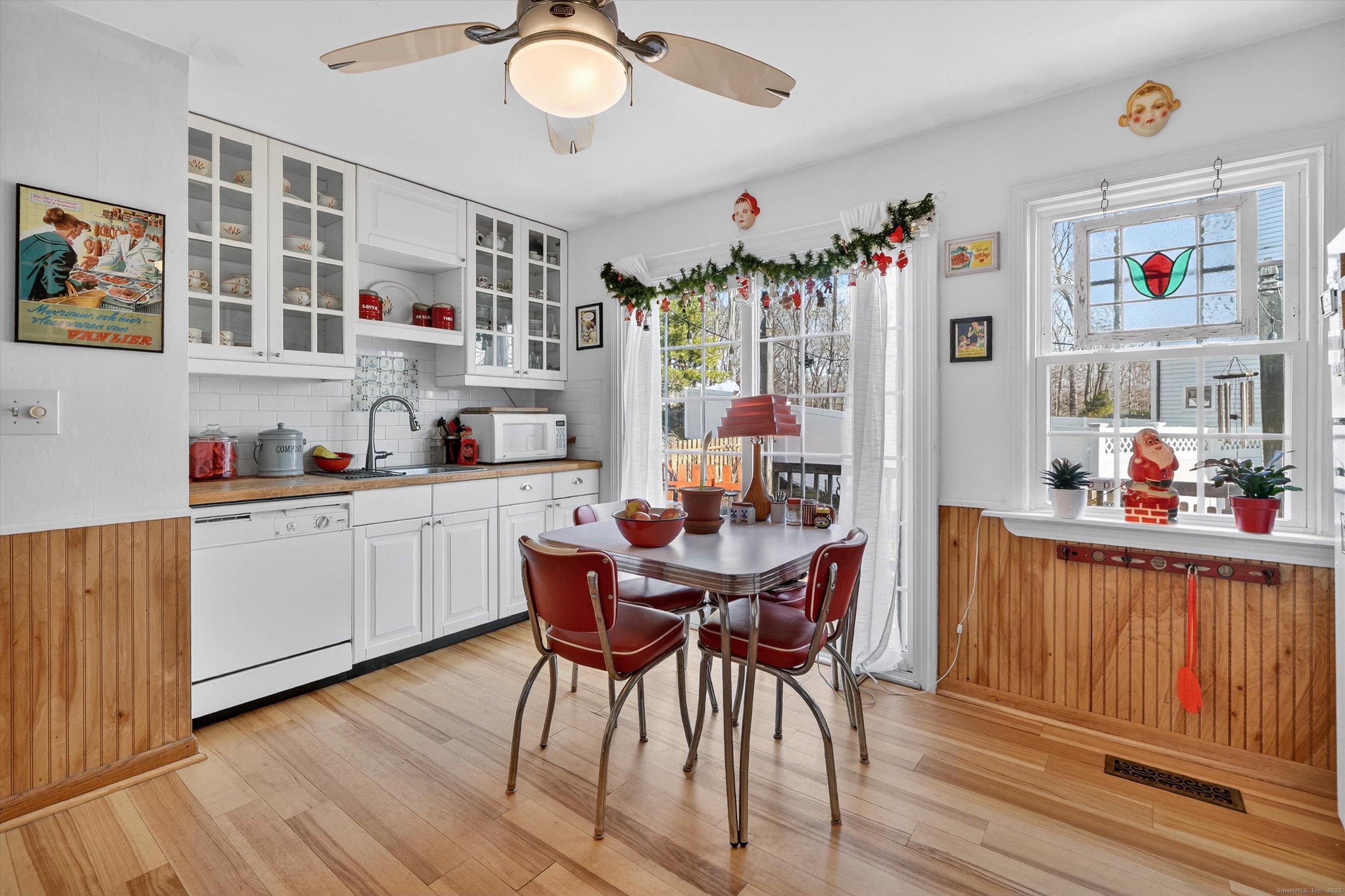 246 Romanock Road Fairfield, CT 06825 - Photo 9 of 37 a view of a dining room with furniture kitchen and wooden floor