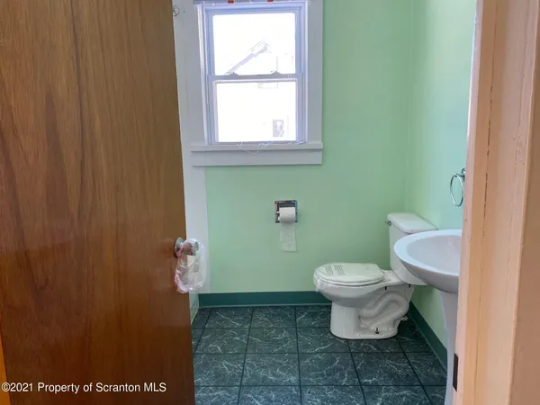 a bathroom with a toilet
