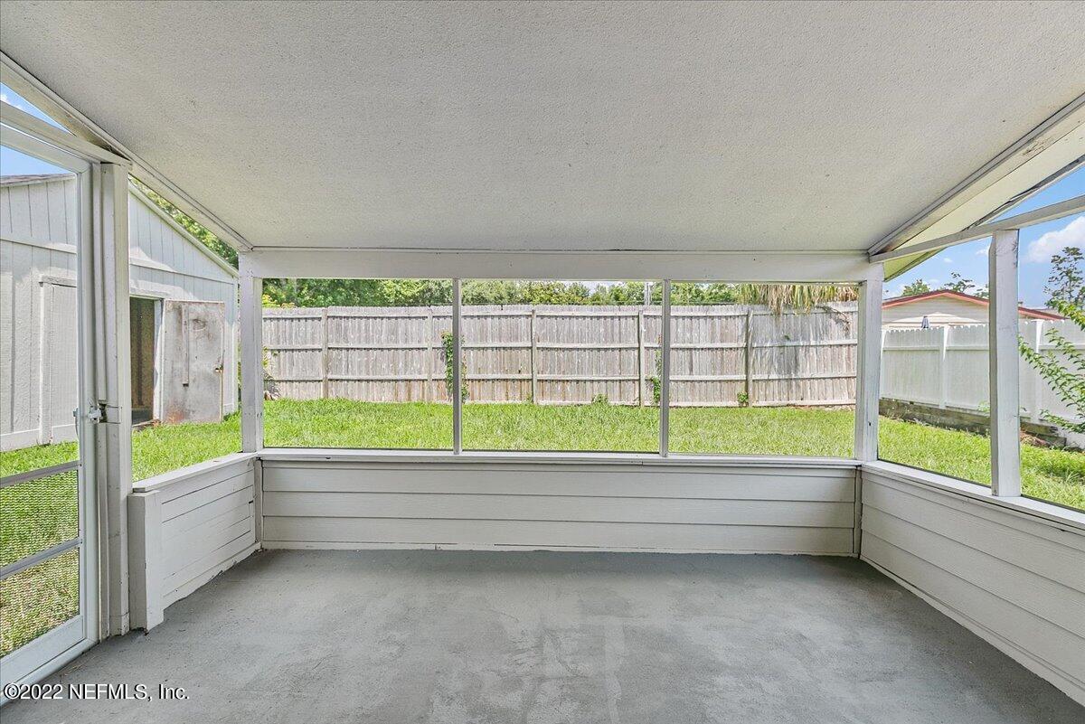 4057 Dayrl Road Jacksonville, FL 32207 - Photo 14 of 21 a view of room with window and view of outdoor space