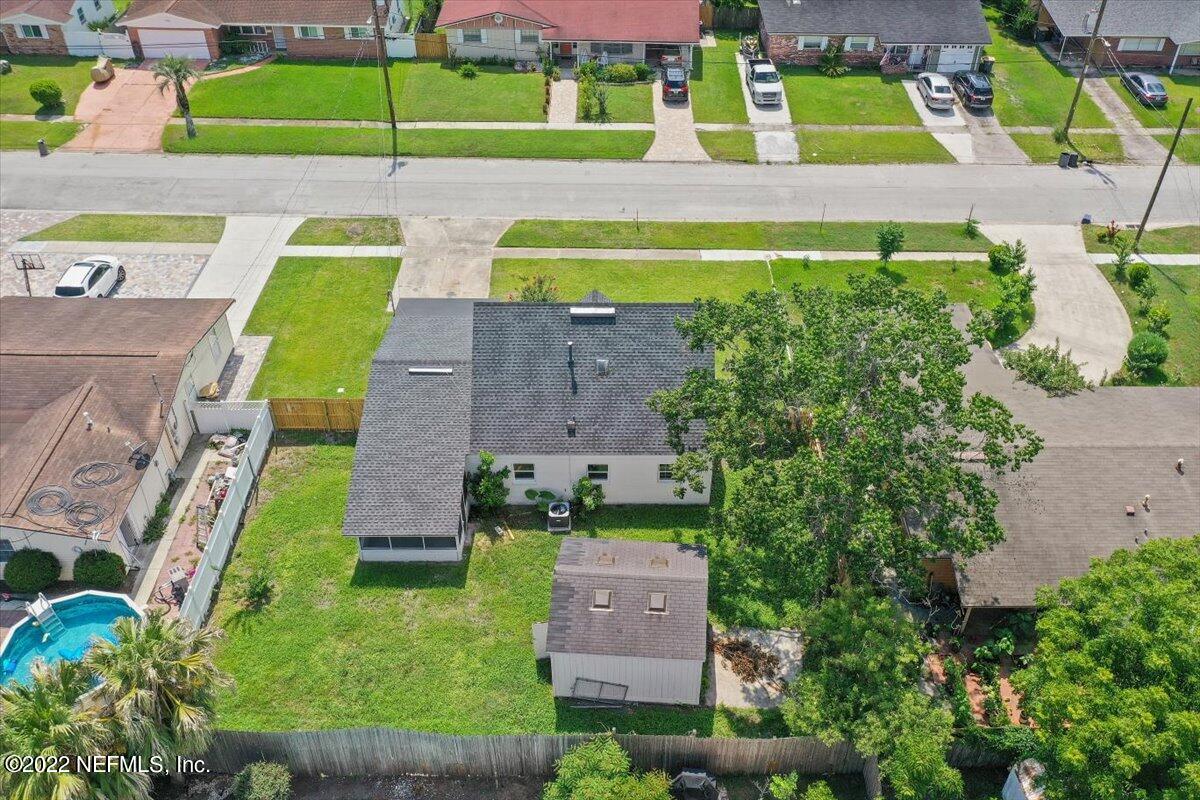 4057 Dayrl Road Jacksonville, FL 32207 - Photo 19 of 21 an aerial view of a house with a garden and a yard