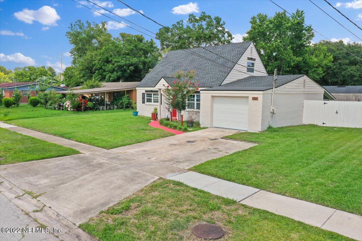 4057 Dayrl Road Jacksonville, FL 32207 - Photo 21 of 21 a front view of a house with a yard and garage