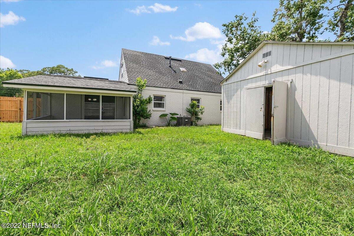 4057 Dayrl Road Jacksonville, FL 32207 - Photo 7 of 21 a front view of a house with garden