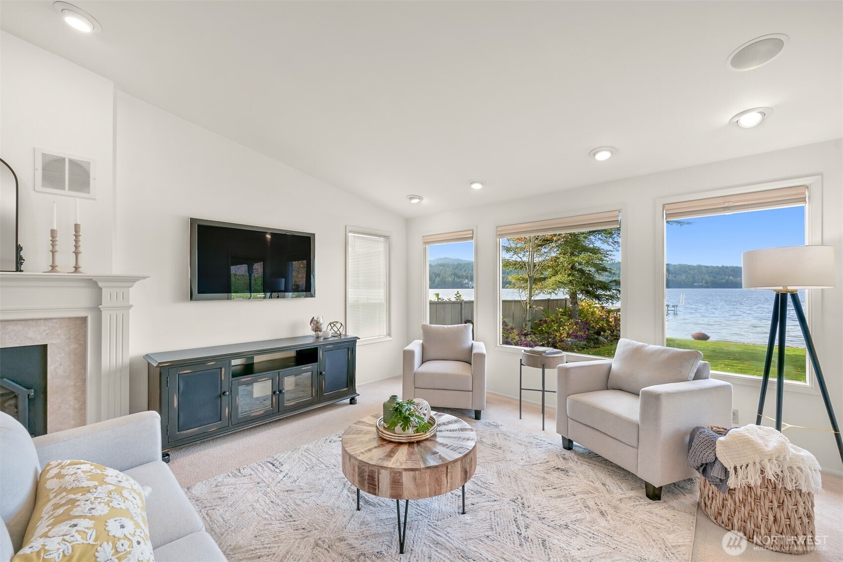 3187 North Shore Road Bellingham, WA 98226 - Photo 12 of 40 a living room with furniture and a flat screen tv