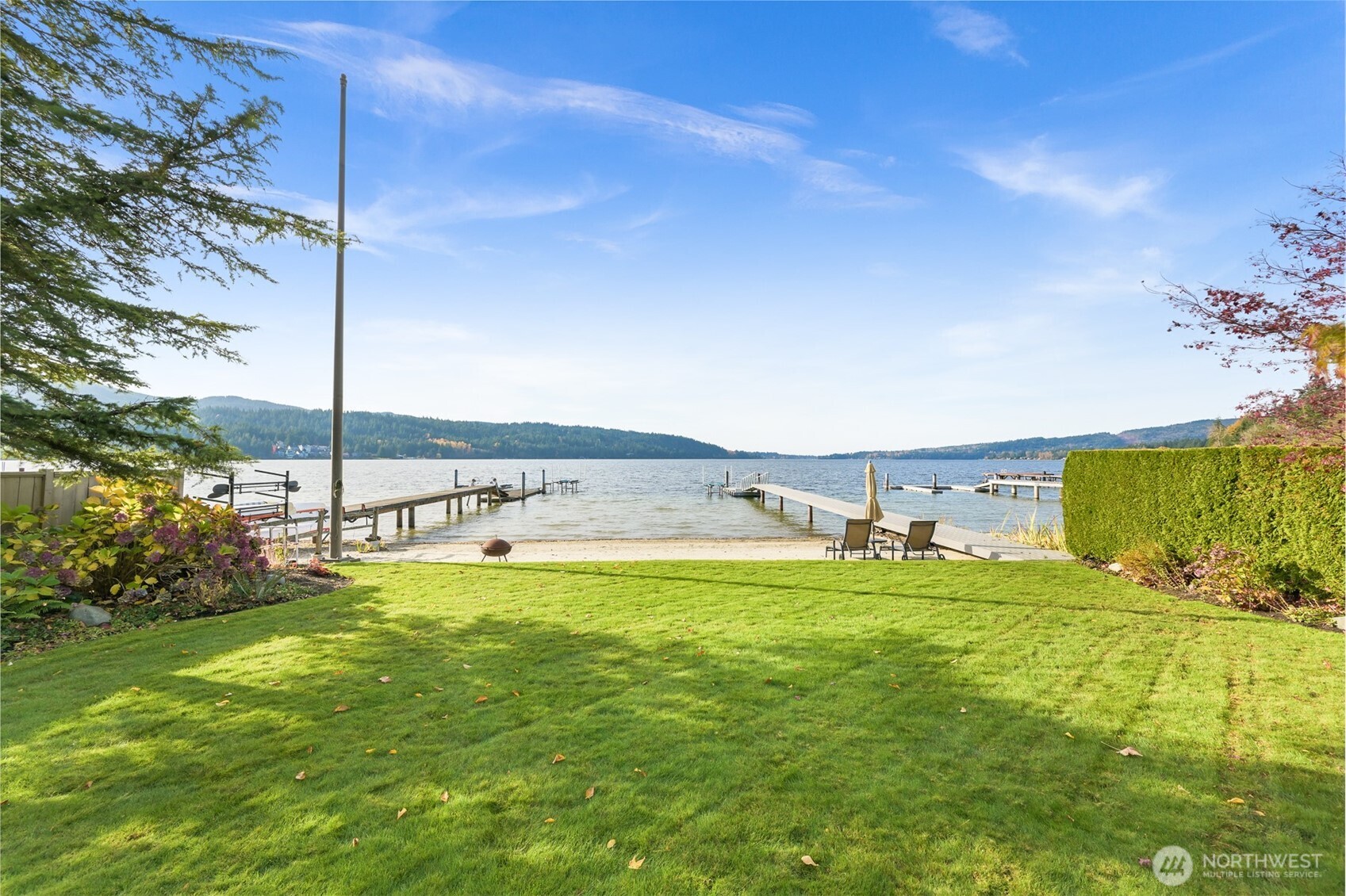3187 North Shore Road Bellingham, WA 98226 - Photo 32 of 40 a view of a swimming pool with an ocean view