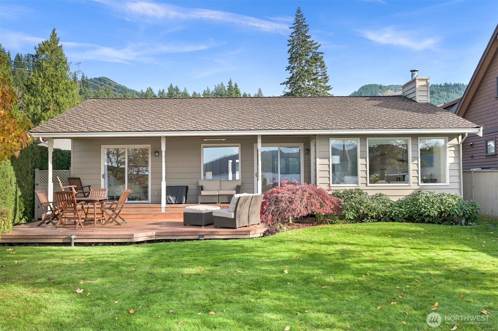 3187 North Shore Road Bellingham, WA 98226 - Photo 35 of 40 a front view of a house with garden and porch