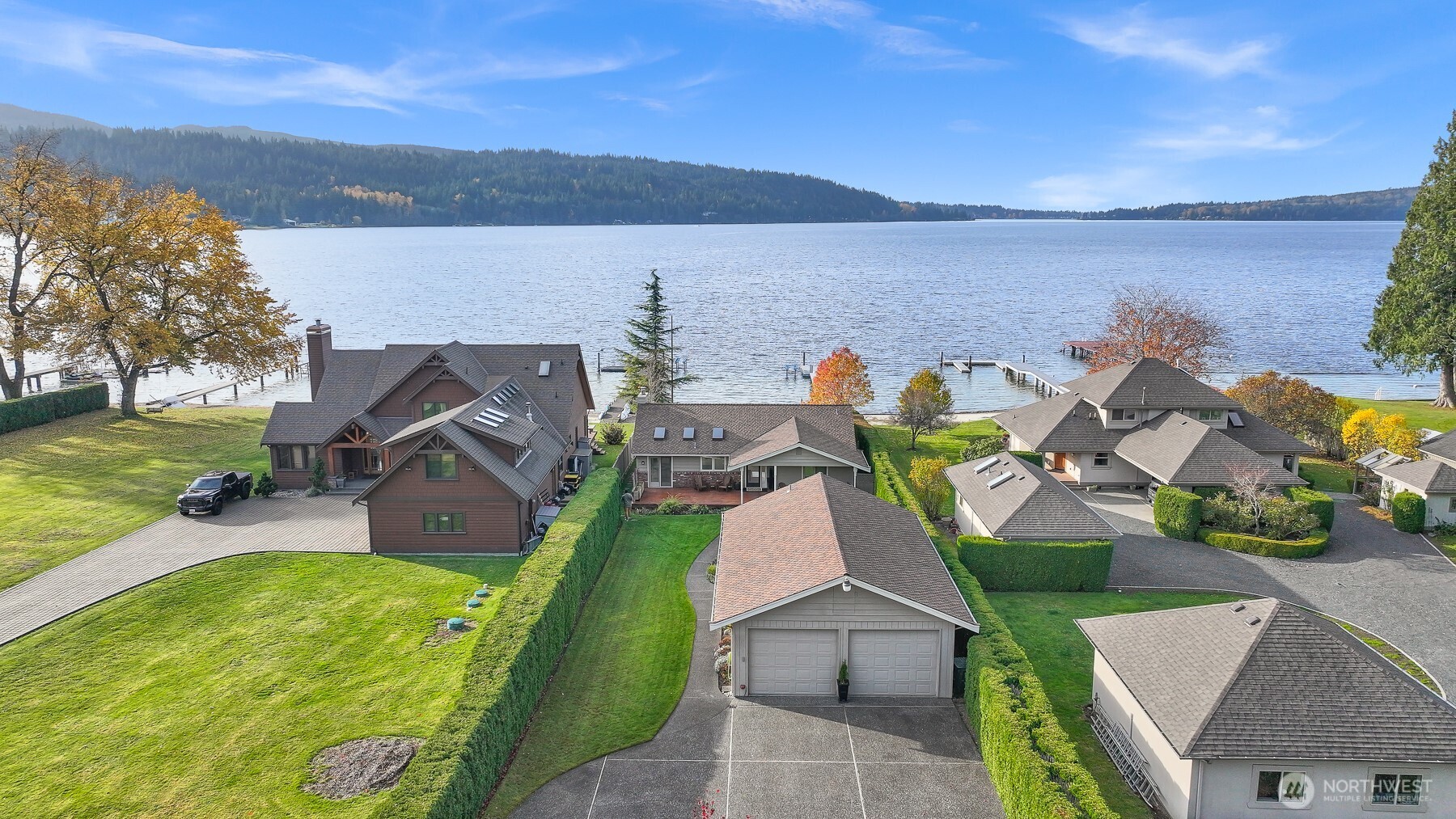 3187 North Shore Road Bellingham, WA 98226 - Photo 10 of 40 an aerial view of a house with outdoor space swimming pool and lake view
