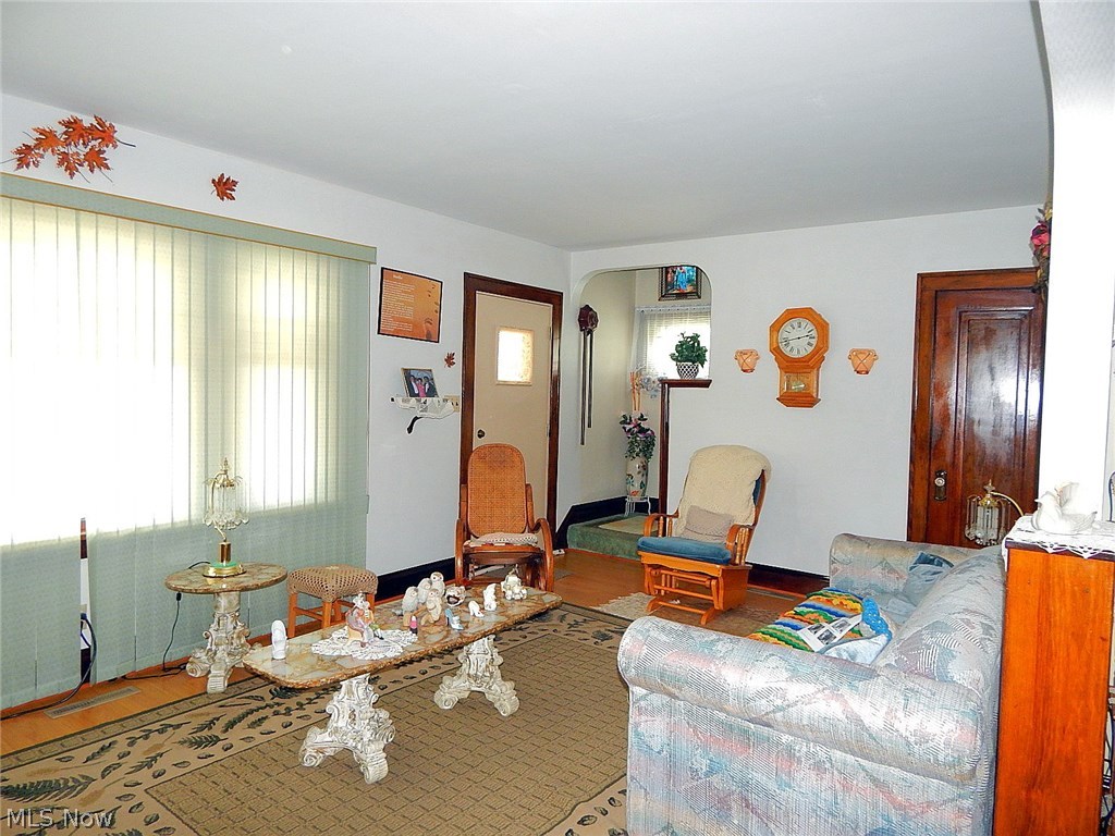 2212 Ralph Avenue Cleveland, OH 44109 - Photo 3 of 15 Access the upstairs bedrooms through the living room.