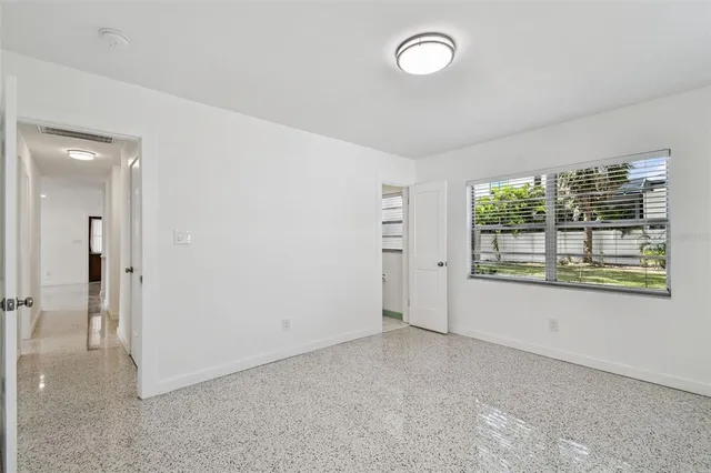 an empty room with windows