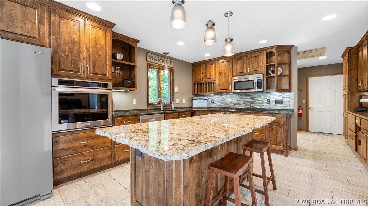 490 Waterfowl Road Linn Creek, MO 65052 - Photo 11 of 52 Stainless Appliances