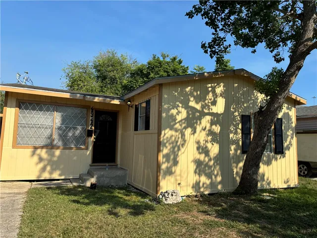 a front view of house with yard