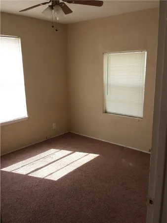 an empty room with a window