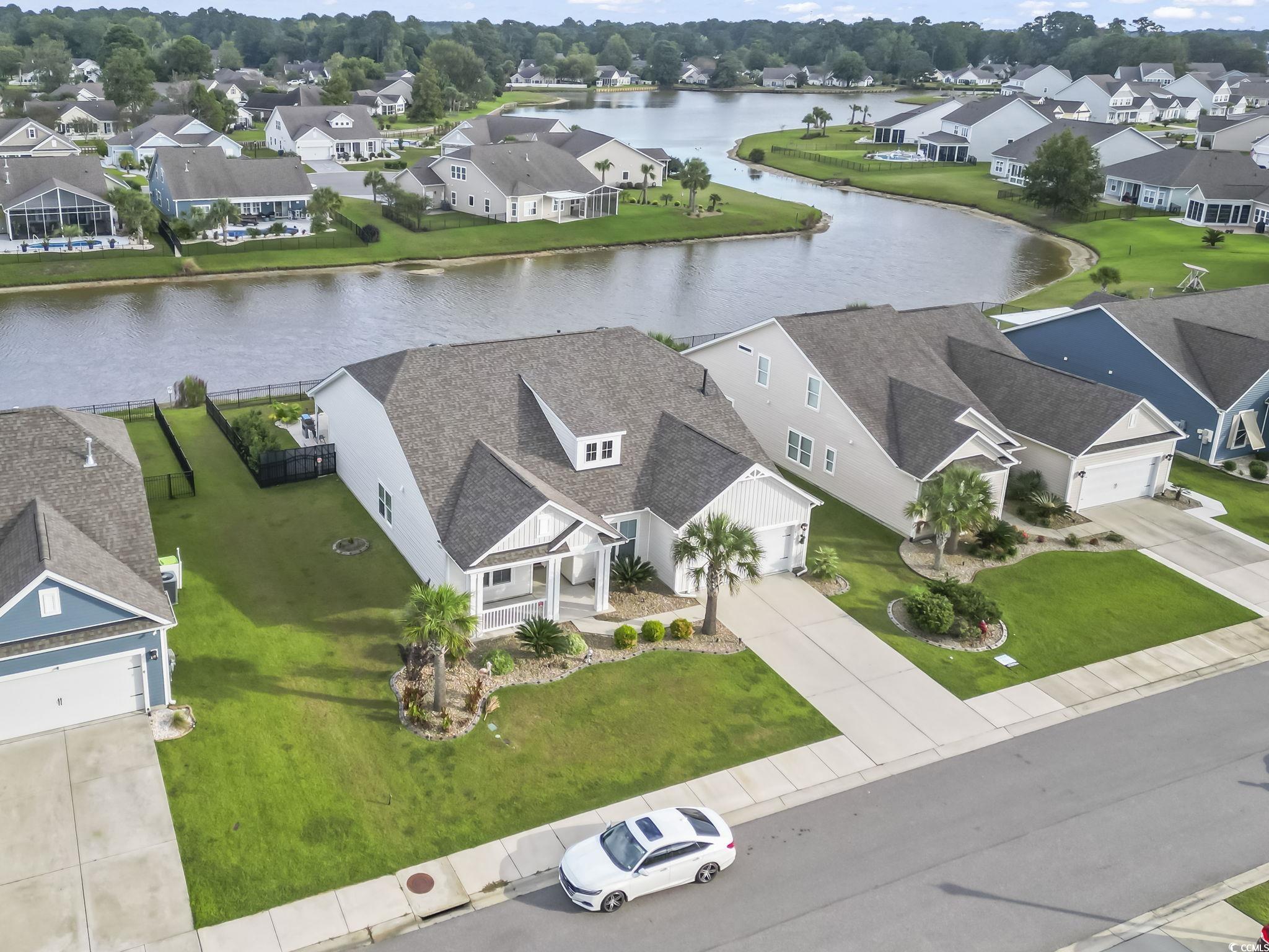 583 Hickman Street Surfside Beach, SC 29575 - Photo 5 of 40 Aerial view of residential area with a nearby body of water