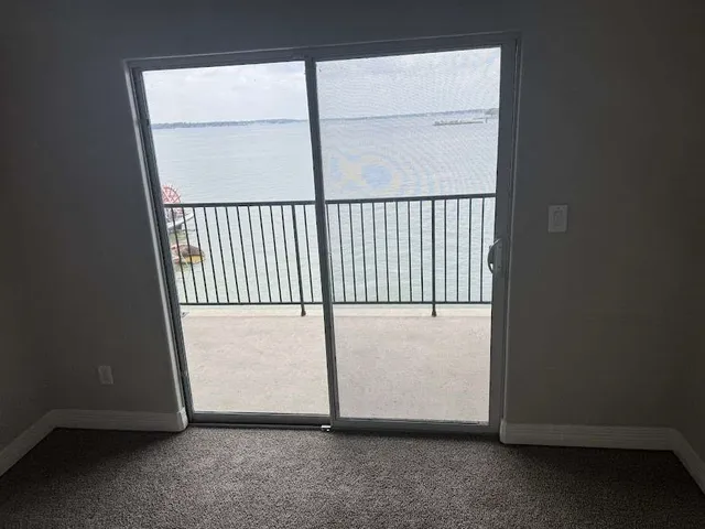 a view of a room with a large window