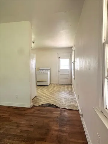 a view of an empty room and window