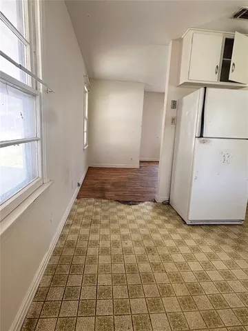 a view of a hallway with closet