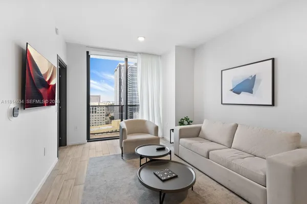 a swimming pool with outdoor seating and yard