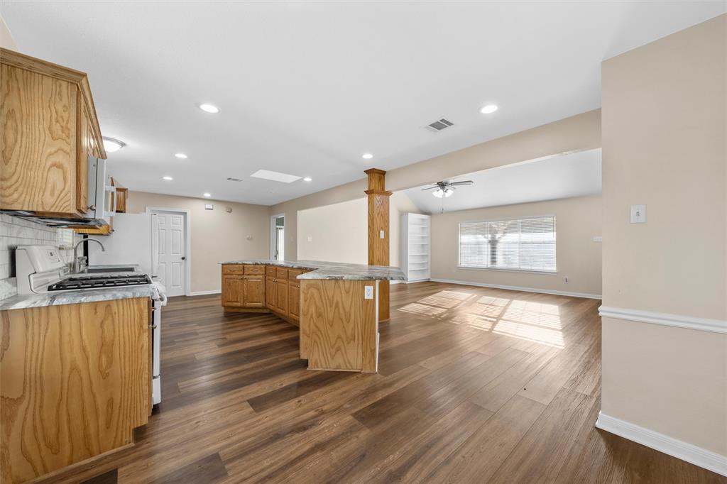 4505 Shady Glen Drive Waco, TX 76708 - Photo 14 of 40 a view of kitchen with sink and wooden floor