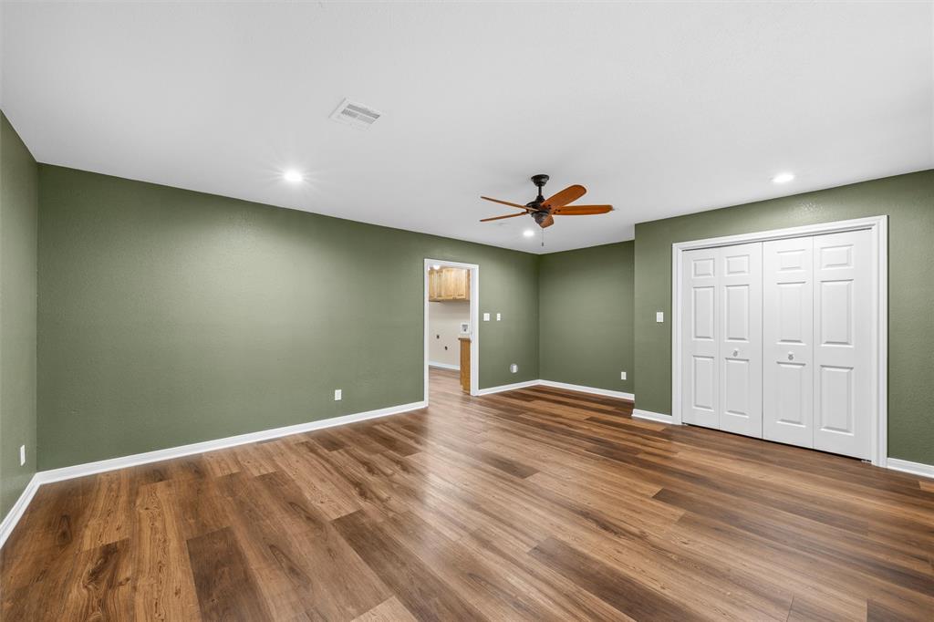 4505 Shady Glen Drive Waco, TX 76708 - Photo 25 of 40 a view of empty room with wooden floor