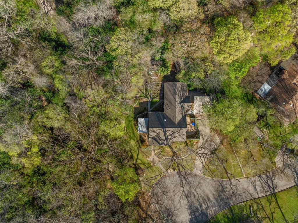 4505 Shady Glen Drive Waco, TX 76708 - Photo 39 of 40 a view of a bench in a garden