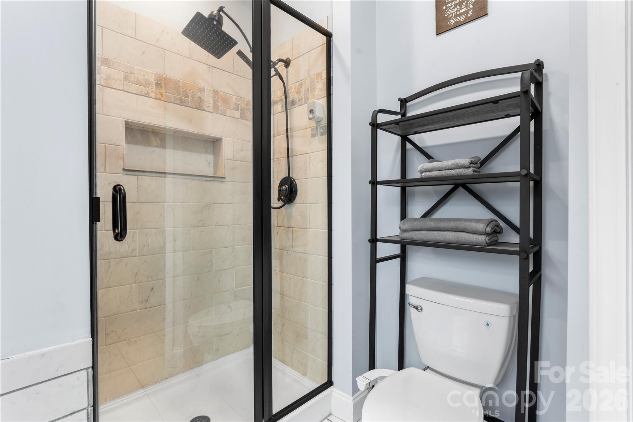 111 Pinewood Road Granite Falls, NC 28630 - Photo 17 of 33 a bathroom with a toilet and a shower