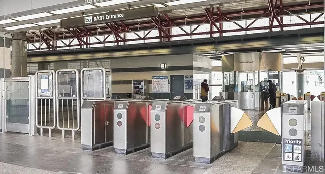 a view of a room with wooden shelves