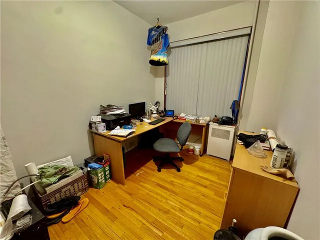 a room with furniture and gym equipment