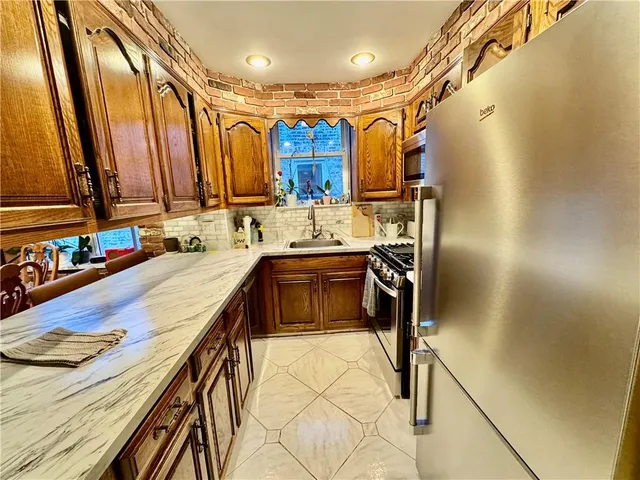a bathroom with a sink double vanity and a mirror