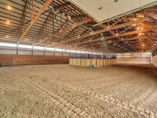 a room with lots of table and mirrors