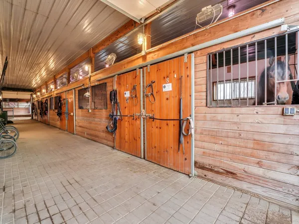 a view of a balcony with furniture
