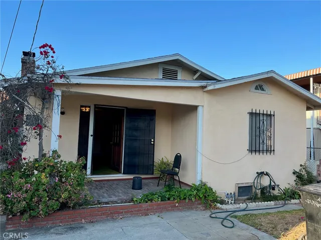 a front view of a house with garage