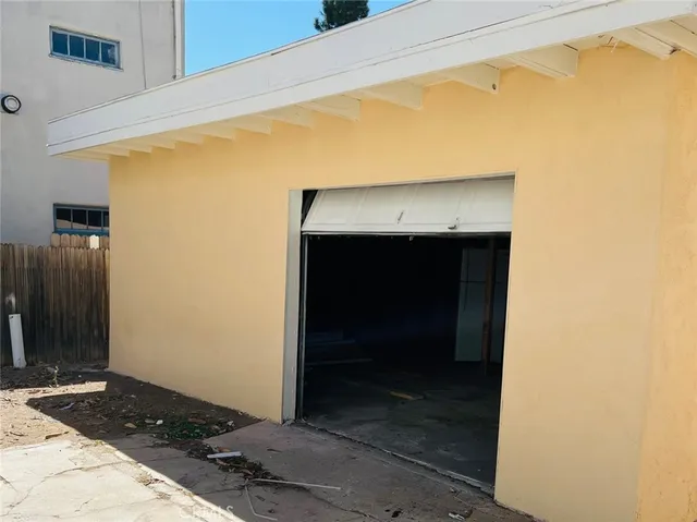 a kitchen with a sink and a stove