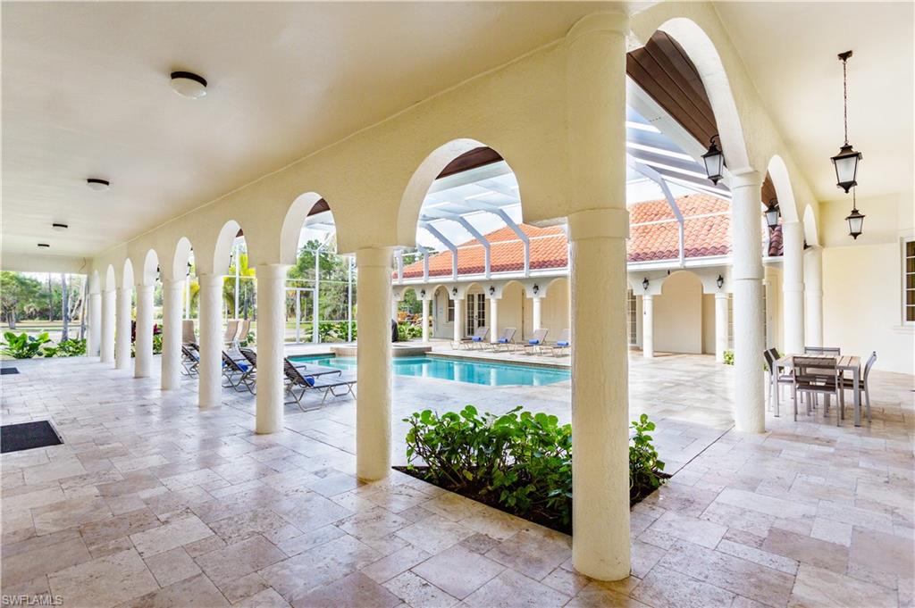 2225 23rd Street Southwest Naples, FL 34117 - Photo 15 of 44 a view of lobby with furniture and garden
