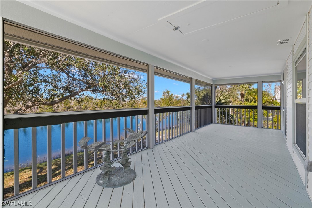 657 Rabbit Road Sanibel, FL 33957 - Photo 11 of 37 a view of a balcony with wooden floor