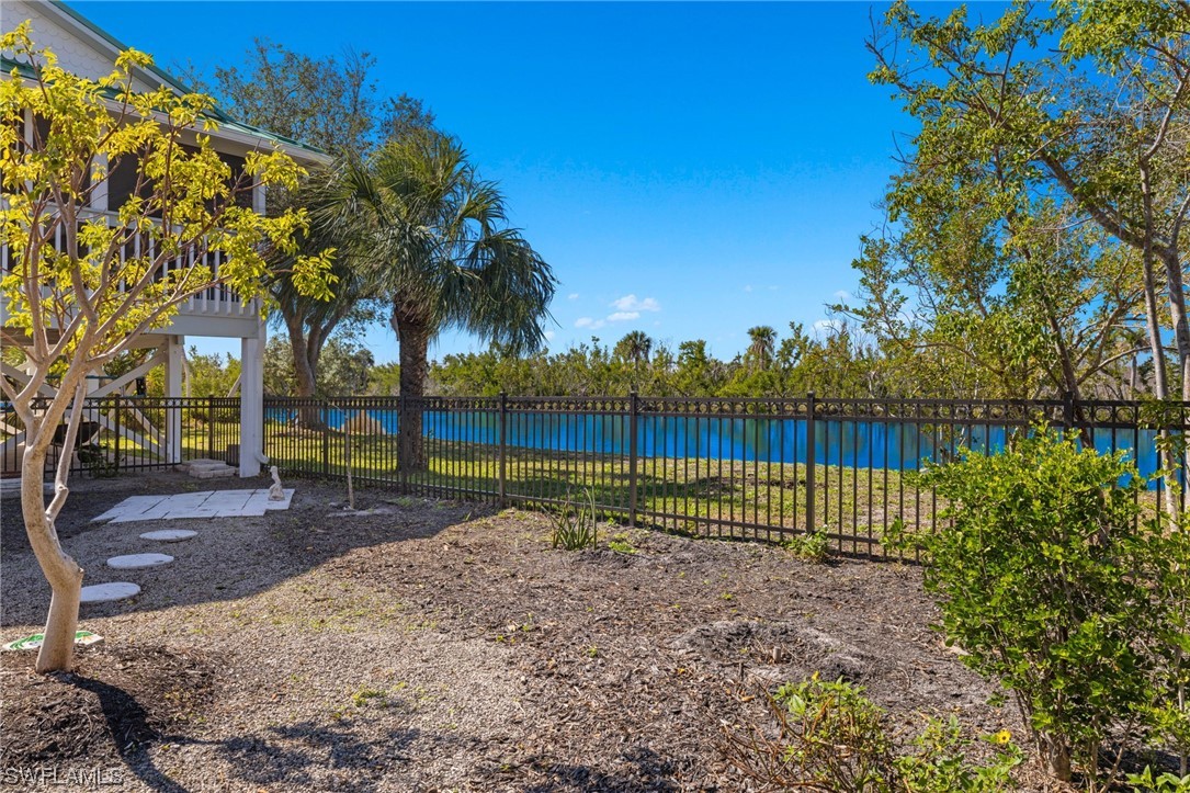 657 Rabbit Road Sanibel, FL 33957 - Photo 13 of 37 a view of a park with large trees