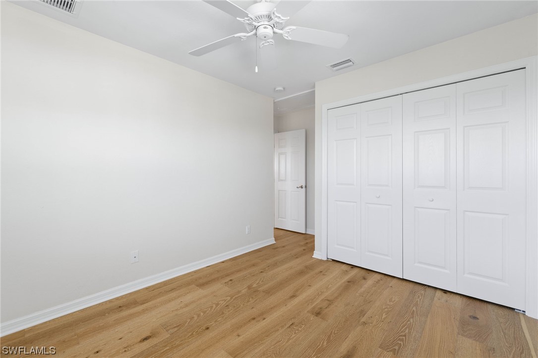 657 Rabbit Road Sanibel, FL 33957 - Photo 28 of 37 wooden floor in an empty room