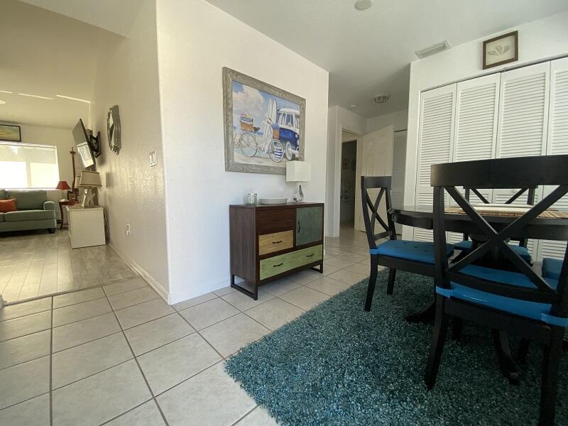 343 Ocean Park Lane, Unit V110 Cape Canaveral, FL 32920 - Photo 18 of 25 a view of a livingroom with furniture