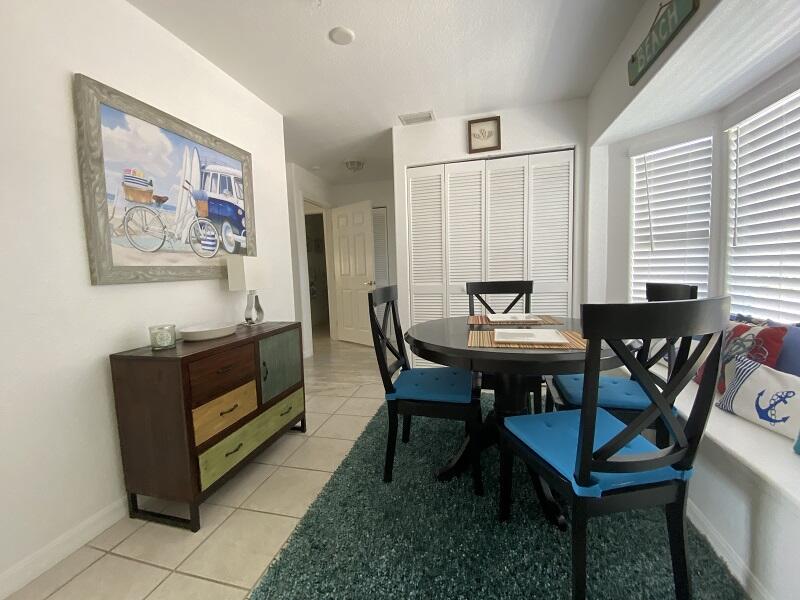 343 Ocean Park Lane, Unit V110 Cape Canaveral, FL 32920 - Photo 3 of 25 a view of a livingroom with furniture and window