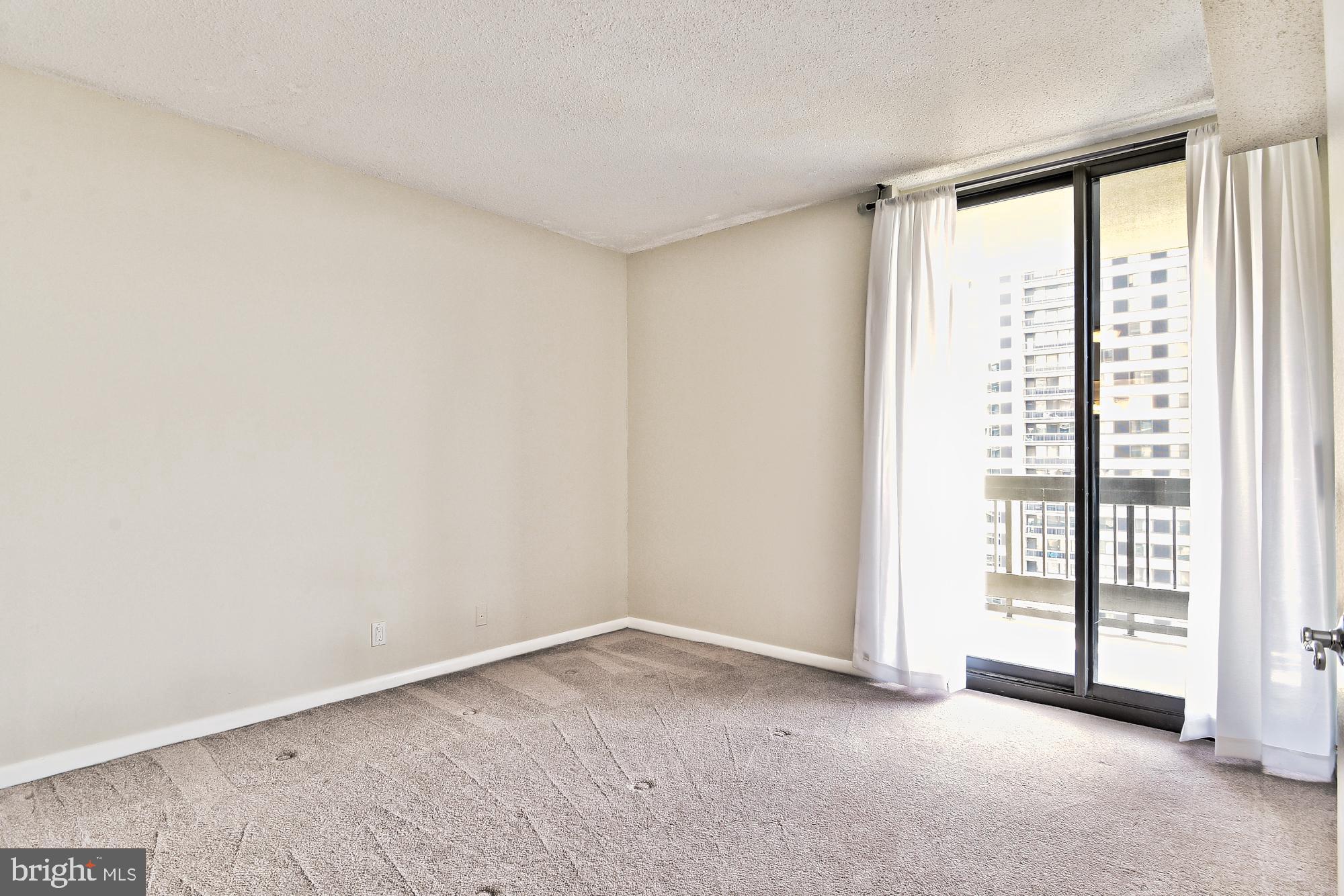 5505 Seminary Road, Unit 1817N Falls Church, VA 22041 - Photo 17 of 31 a view of an empty room with a window
