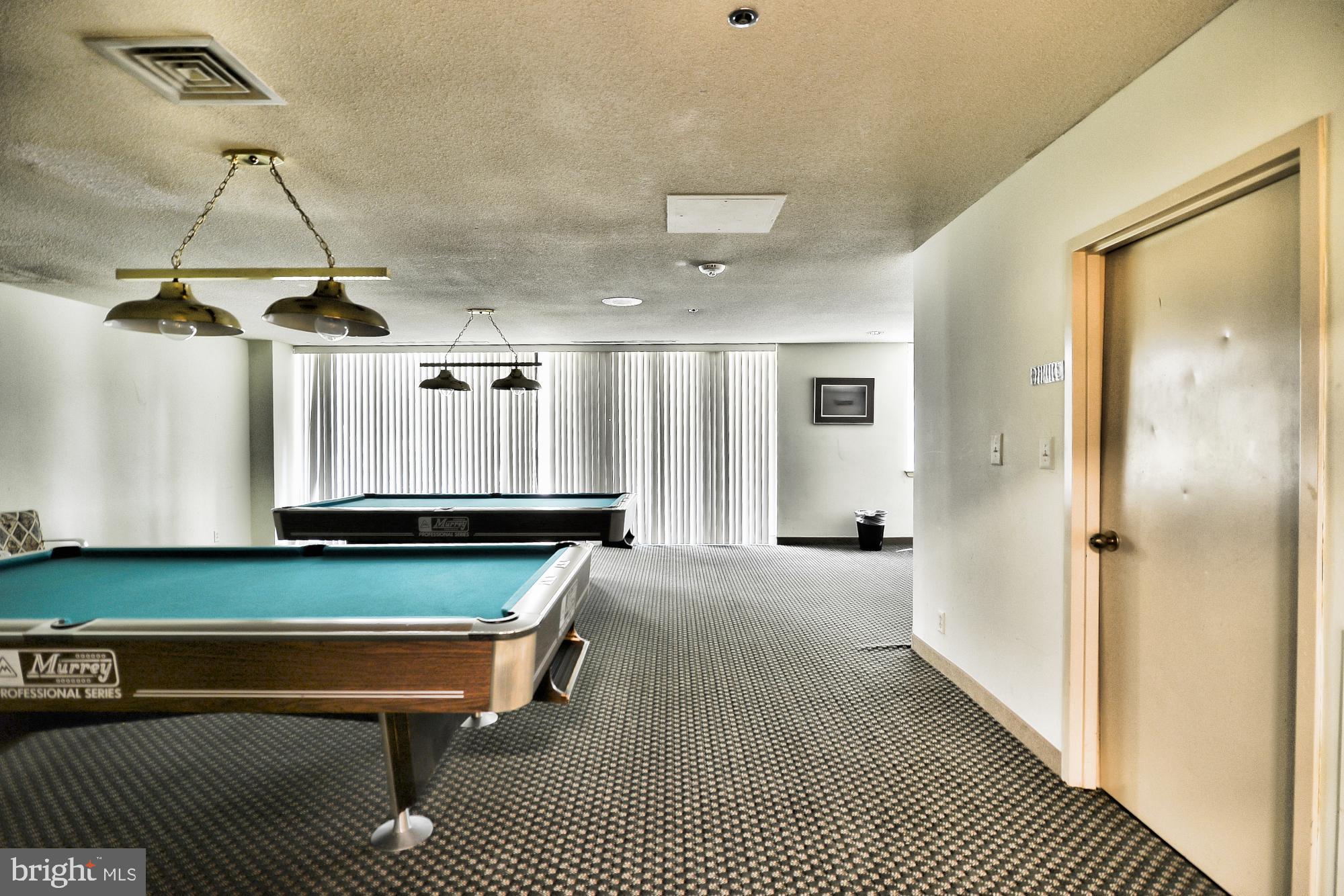 5505 Seminary Road, Unit 1817N Falls Church, VA 22041 - Photo 25 of 31 a room with pool table and windows