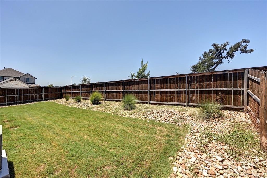 2133 Alamar Walk Leander, TX 78641 - Photo 22 of 25 a view of a backyard