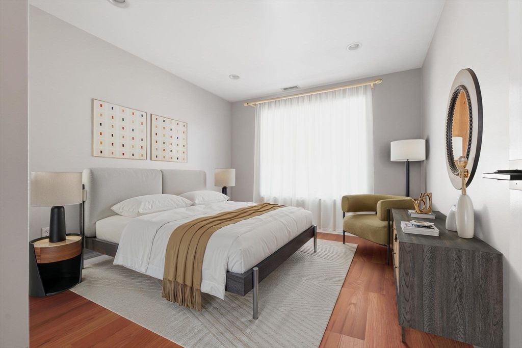 85 Bridge Street, Unit 4 Salem, MA 01970 - Photo 20 of 31 a bedroom with bed and a table