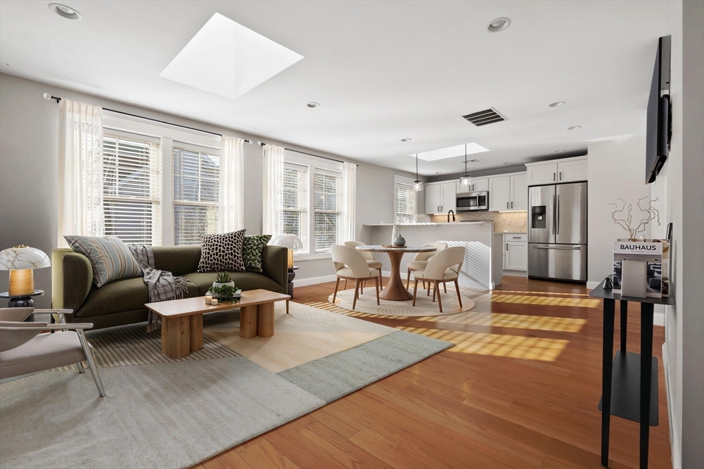 85 Bridge Street, Unit 4 Salem, MA 01970 - Photo 2 of 31 a living room with furniture and a table