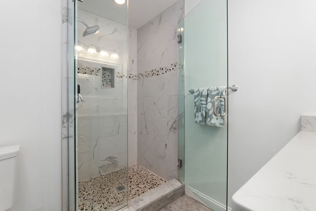 85 Bridge Street, Unit 4 Salem, MA 01970 - Photo 25 of 31 a bathroom with a shower