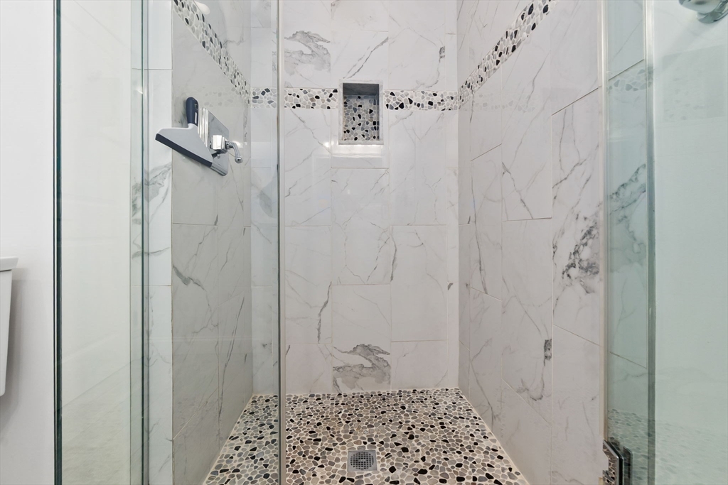 85 Bridge Street, Unit 4 Salem, MA 01970 - Photo 25 of 32 a bathroom with a shower