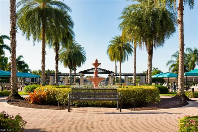 a view of outdoor space with palm trees