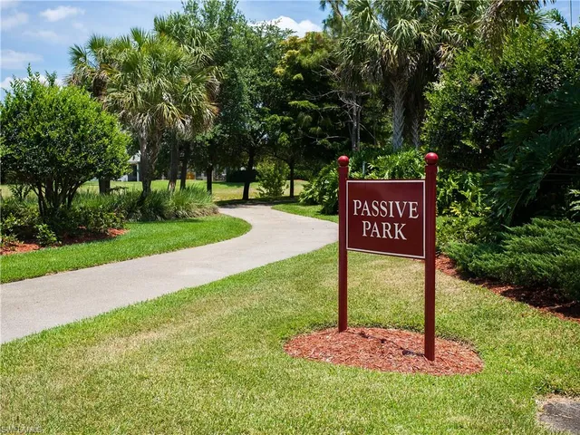 a sign on the side of the road