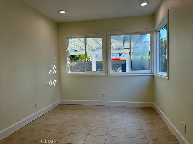 a view of hallway with wooden floor