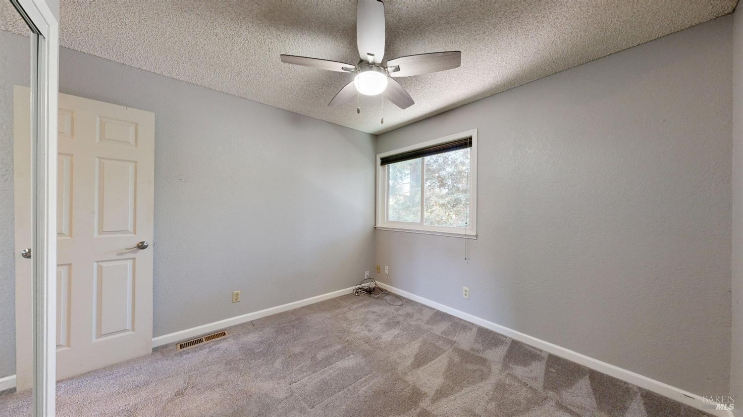 4571 Harbor Lane Rohnert Park, CA 94928 - Photo 45 of 79 a view of an empty room with a window