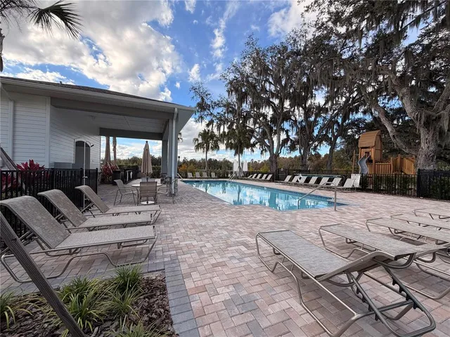 a table and chairs sitting on a terrace