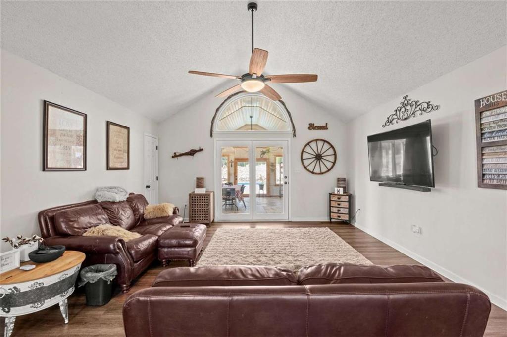 6058 Mt Zion Road Waco, GA 30182 - Photo 27 of 72 a living room with furniture and a window